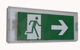 Emergency exit sign with a person icon and right arrow on a green background